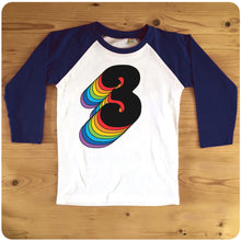 Load image into Gallery viewer, Third Birthday Three Raglan T-Shirt With Retro Rainbow Drop Shadow available in red or blue