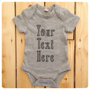 Personalised babygrow / baby onesie available in grey, blue, yellow & white (drop shadow text)