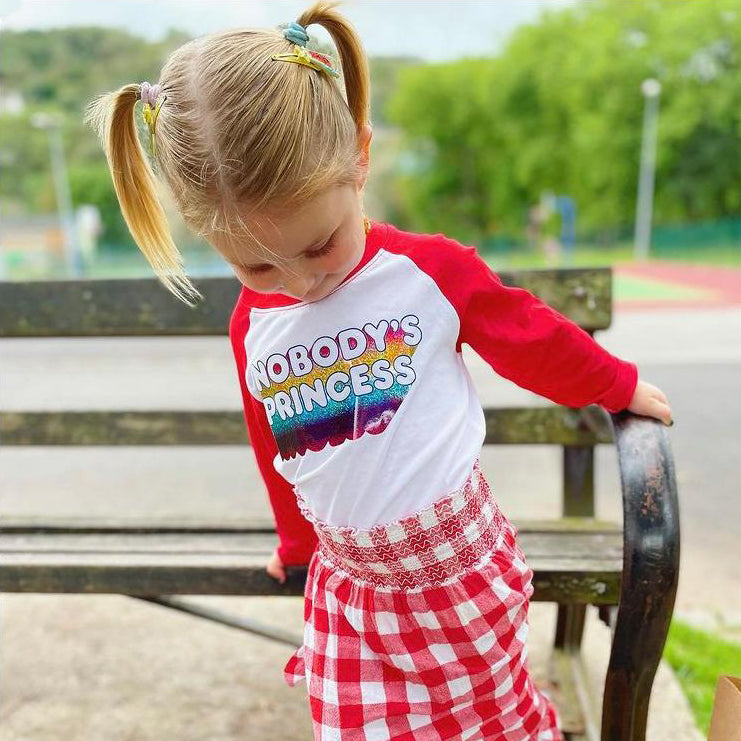 Nobody's Princess sparkly rainbow glitter feminist red or navy raglan long-sleeve baseball